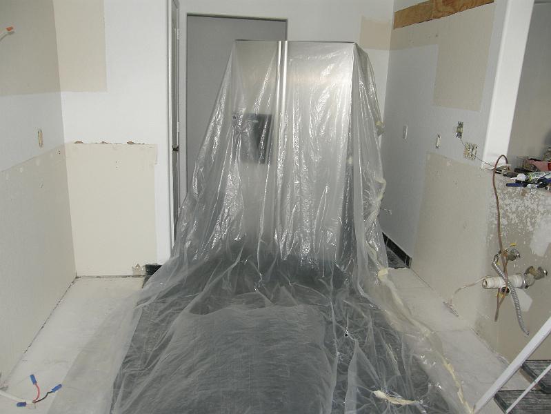 04 Everything Removed and the Floor and Fridge Protected for Painting.JPG